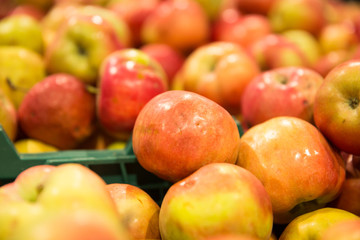 Yummy pile of apples in a market stall