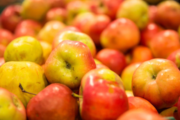 Yummy pile of apples in a market stall