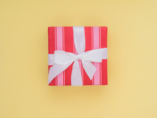Wrapped gift box.  Pastel Colour flat lay minimal concept. Lime punch.