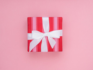 Wrapped gift box.  Pastel Colour flat lay minimal concept.