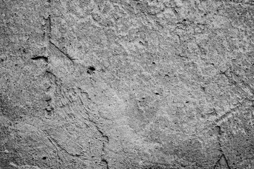 Wall fragment with scratches and cracks