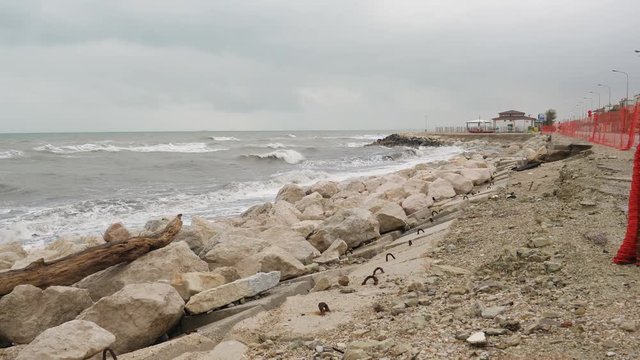Coastal flooding and beach erosion, pan shot