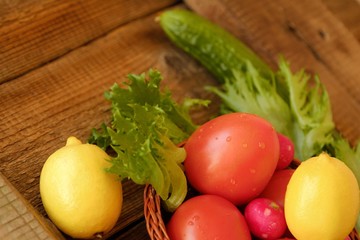 Summer vegetables and fruits on a wooden table 