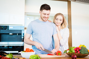 Obraz na płótnie Canvas couple preparing food