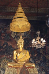 Close up big golden budhha statue in wat pho,Bangkok Thailand