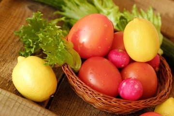 Summer vegetables and fruits on a wooden table 