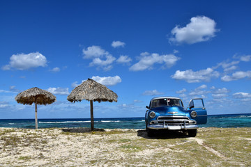 American classic car on cuban beach, Cuba. 