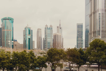 Fototapeta premium Skyscrapers of the Pudong area against the blue sky, Shanghai, China