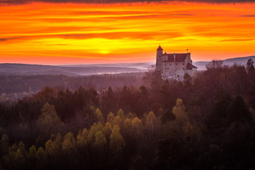 Fototapeta premium Sunrise over the castle in Bobolice, Silesia, Poland