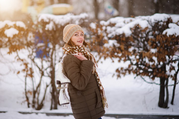 the girl on the figured skates on a opened skating rink