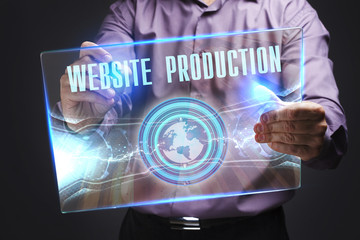 The concept of business, technology, the Internet and the network. A young entrepreneur working on a virtual screen of the future and sees the inscription: Website production
