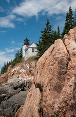 Fototapeta na wymiar A view of Bass Harbor Lighthouse from the rocks below