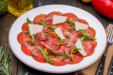 Beef carpaccio with Parmesan and arugula