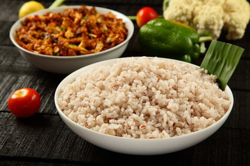 Healthy diet concept- cooked red rice with vegan curry roast