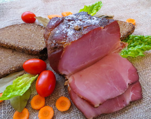 dried meat, ham, sausage, smoked meat pies, prepared according to traditional recipes, together with bread and vegetables