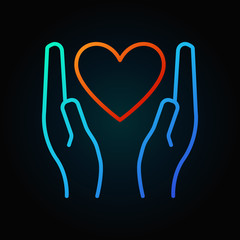 Heart in hands colored linear icon or sign
