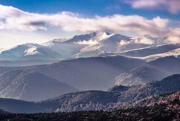 Fototapeta premium Mountains sunset and fog landscape.