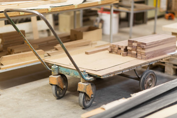 boards on loader at furniture factory workshop