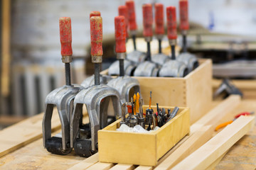 drills and woodworking tools at workshop