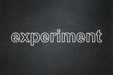 Science concept: text Experiment on Black chalkboard background
