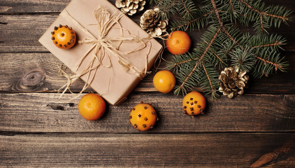 Christmas New Year composition with tangerines and pine cones