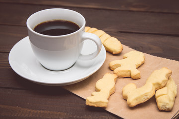 White cup of coffee with cookies, toning. Morning concept, template to media and content sites.