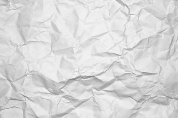 Background of a white crumpled paper.