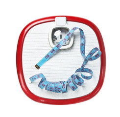 measuring tape and floor scales isolated