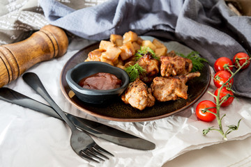 roasted sleeves chicken with potatoes and barbecue sauce