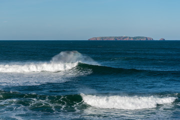 Atlantic ocean foamy waves near Peniche , Portugal.