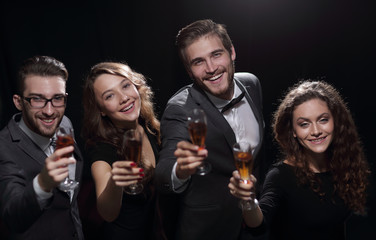 happy young people with a glass of wine.