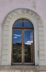 Typical ancient window of a medieval village in Tuscany