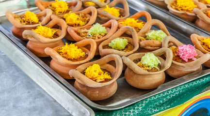 Thai desserts, delicious snacks for sale at the market.
