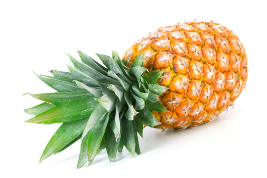 pineapple with fresh green leaves isolated on white background