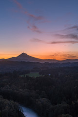 Early morning colorful sunrise light over a perfect valley