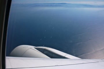 the view from the window of a turist airliner, traffic speed boats, Thailand