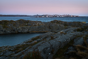 View at the coastal city on an island at sunset.