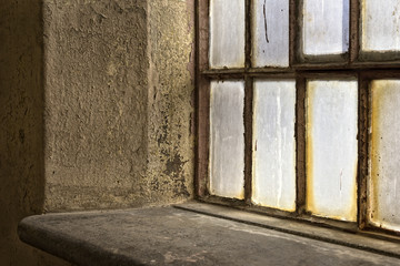 Detail of a window in an old factory building