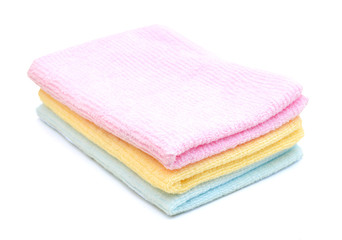 Obraz na płótnie Canvas colorful towels isolated on white