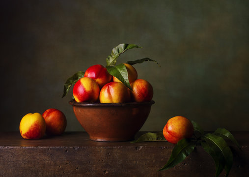 Still life with nectarines in the bowl