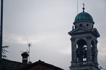 Fototapeta na wymiar Church tower early in the morning in Milan, Italy