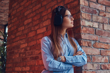 Portrait of a charming brunette in a studio.