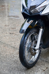 Obraz premium black sports bike in drops of water.Asia.Thailand