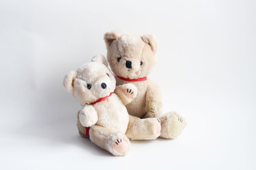 Two teddy bear cuddling - isolated
