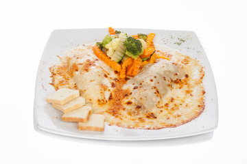 gratin cannelloni accompanied with cooked vegetables
