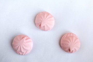 Fototapeta na wymiar Delicious and sweet pink marshmallow and white background