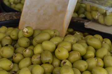 Sale in the market of stuffed boneless olives