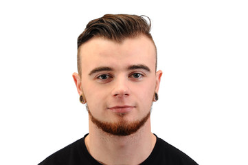 Obraz premium Collage of a handsome young man, with a beard and tunnels in his ears, isolated on white