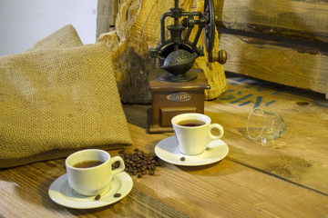 cup of coffee, coffee-beans, coffee grinder, coffee sack