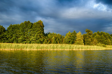 Fototapeta na wymiar Beautiful lake at sunset. summer scene photographed in Poland